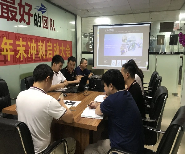Aerospace DFM analysis team optimizing mold design for cost savings